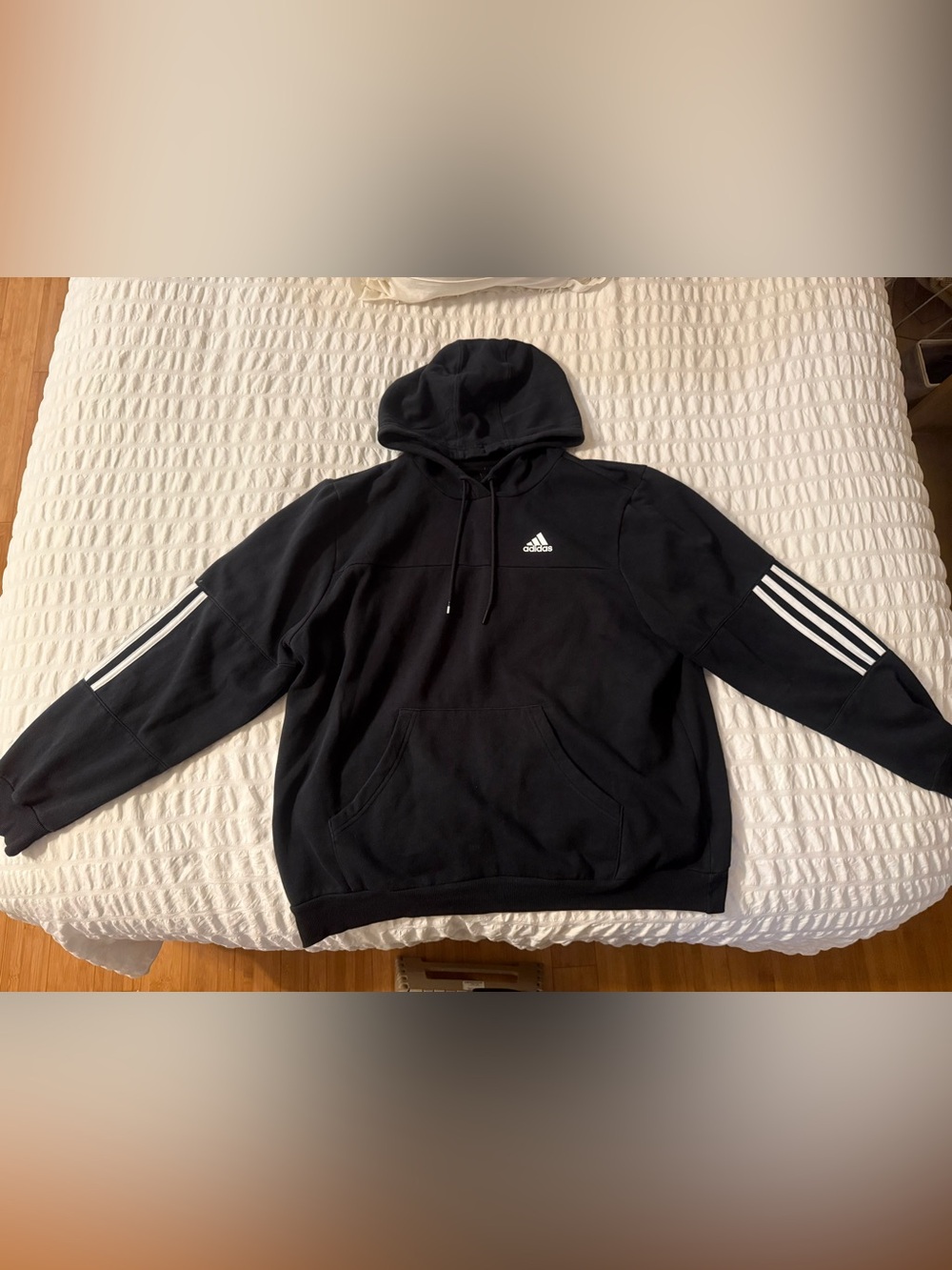 Adidas Black Hoodie with White Three-Stripe Sleeves